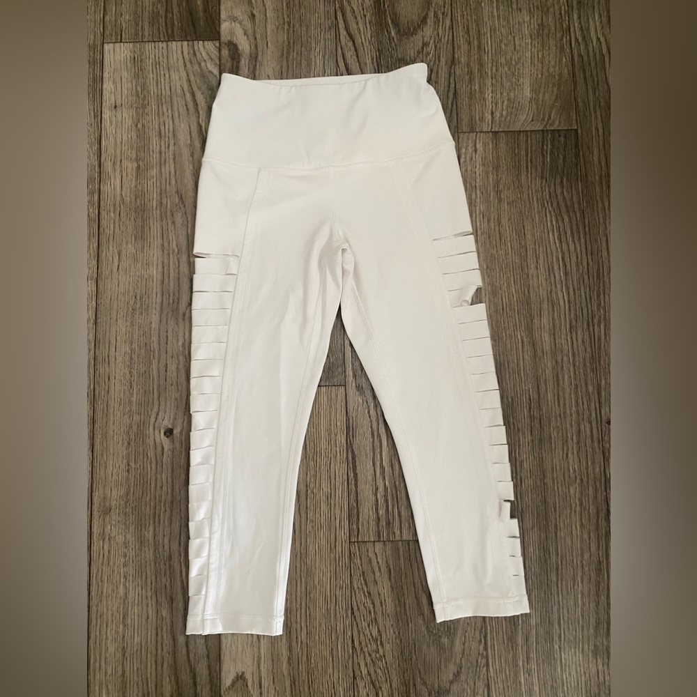 Zella Cropped white leggings with cutout sides down the leg!